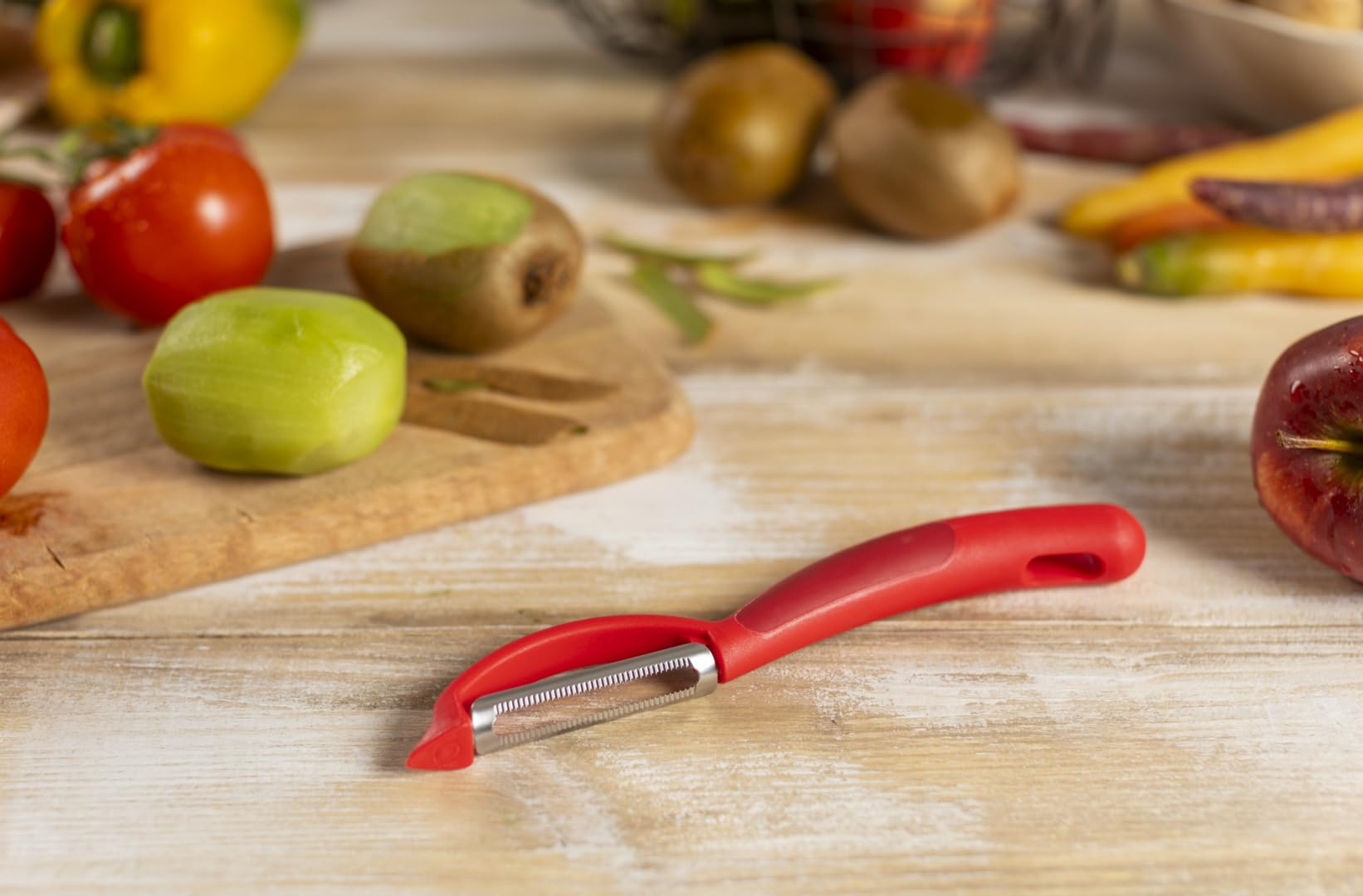 kuhn-rikon-sparsch-ler-swivel-gezackt-rot-edelstahl image 2